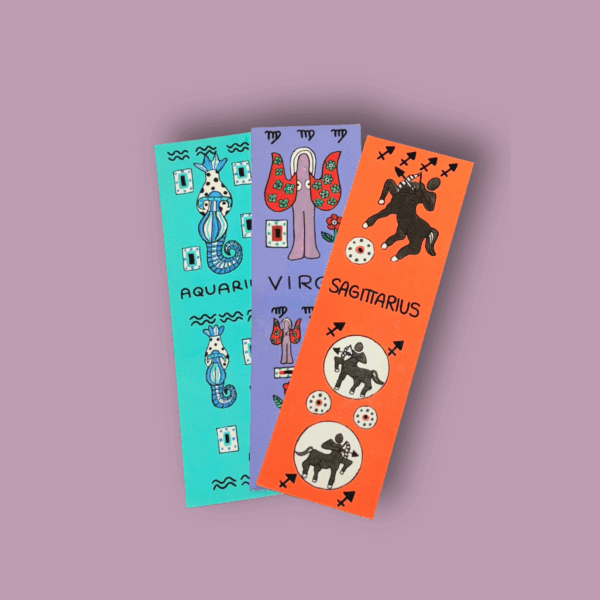 Tre segnalibri illustrati di Andrew Morgan dedicati ai segni zodiacali Aquarius, Virgo e Sagittarius, con sfondi colorati azzurro, lilla e arancione e disegni stilizzati a tema astrologico.